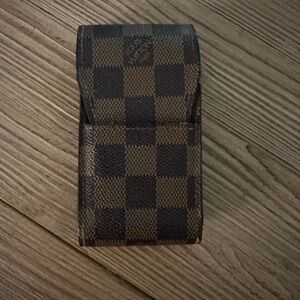 Authentic Louis Vuitton cell phone/ card holder.